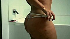 Sensual big tits BBW Latina plays in lingerie at hotel