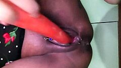 brazilian milf squirts wildly fingering pussy with carrot