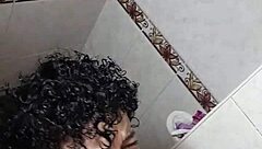 latina lesbian squirts wildly in steamy solo shower