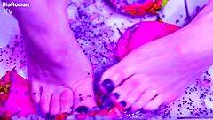 bare toes smash juicy fruit so close up