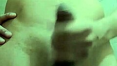 Skinny guy strokes huge cock in work bathroom solo