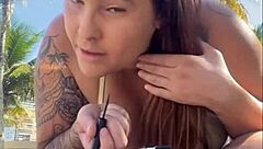 Horny beach exhibitionist flashes big pussy for guys