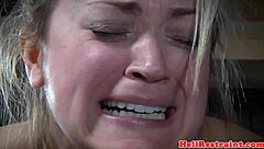 restrained bdsm sub endures intense caning from black master closeup