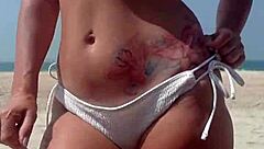 fat ass pees white bikini on crowded public beach!