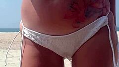 fat ass pees white bikini on crowded public beach!