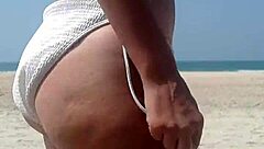 fat ass pees white bikini on crowded public beach!