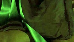 two lesbian slaves kneel before their mistress wielding strap-ons for intense femdom pleasure