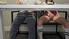 skinny college student flashes wet pussy under desk