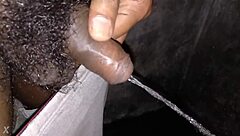 in the indian bathroom a massive black cock unleashes hot piss