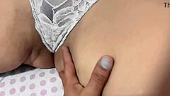 sexy latina teases playfully in intimate bedroom fun