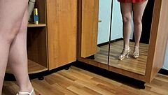 a hairy milf masturbates to orgasm in mirror with dildo