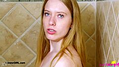 Bright-Eyed Blonde Enjoys Steamy Shower Session