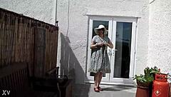 naughty housewife strips naked outdoors garden