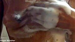 Ginger's wet soapy nipples tits belly closeup in ripped jeans