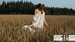 cute 18+ redhead teen wanders field fingering her wet pussy