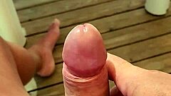 Naked camper strokes huge cock on terrace edge