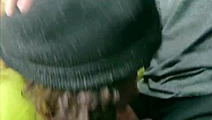 Busty black amateur with blonde hair gives a blowjob on the street