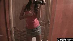 Cute teen enjoys solo play with camera