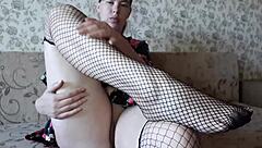 Horny slut in fishnet socks masturbates with toy