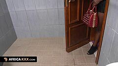 Busty African babe enjoys doggystyle in club restroom