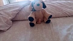 Jerking off my nylon-clad dog with a plush toy