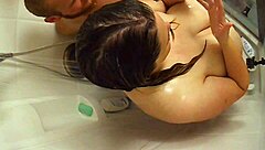 Amateur couple enjoys shower and fucking session