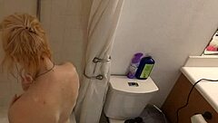 Annie's cute bathroom bath with shower and toys