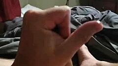 White amateur masturbates a big load of cum while watching porn