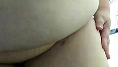 Boldly undressing in the office, the fat nude woman exposes herself publicly outdoors at work.