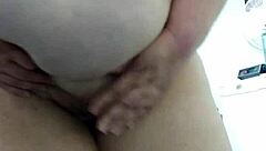 Boldly undressing in the office, the fat nude woman exposes herself publicly outdoors at work.