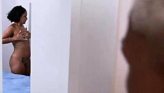 Chatting with a young woman who interacts playfully with a bold guy