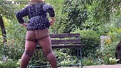 this chubby milf is pissing outdoors in nylon pantyhose, homemade style
