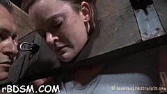 What happens when a boxed-up brunette slave gets teased with toys and bdsm play?