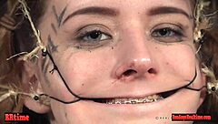 Submissive Slave Endures Bondage Torment from Maledom and Femdom Partners in Rough BDSM Session