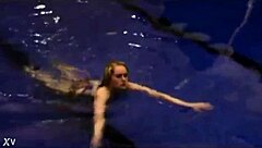 blonde girl in bikini enjoys a hassle-free night outdoors