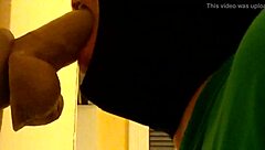 Bold gay guy in hood deepthroats dildo