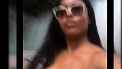 Bikini-clad showoff struts her stuff in pool