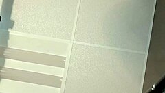 Playing with new dildo in work bathroom