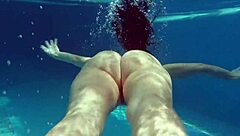 Kittina Ivory undresses in the swimming pool