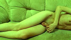 A skinny young boy enjoys a peaceful rest after activities