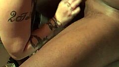 She eagerly sucks his massive black cock, her big tits bouncing as she takes it deep into her mouth.