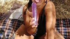Devska says, Watch me fuck myself with this big dildo outdoors.