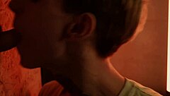 Twink Gives Detailed Blowjob Through Glory Hole in Gay Encounter