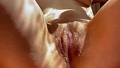 Hot wet girl masturbates her tight shaved pussy