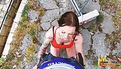 in this dtfdating video, a tattooed brunette milf gets fucked outdoors in doggy pov, deepthroating and taking a cumshot