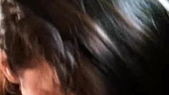 A Latina BBW performs deepthroat in public outdoors by the car