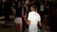Teen sucking cock in a group setting at college