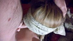 Teen sucks shaved cock, cumming on tits in bed scene.