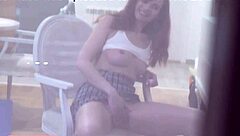 Spying on Jeny Smith through the window as she takes nude selfies