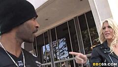 Busty milf Michelle McLaren engages in an interracial encounter with a big black cock